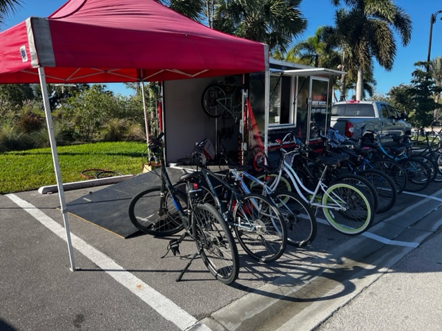 a bicycle parked on the side of a road