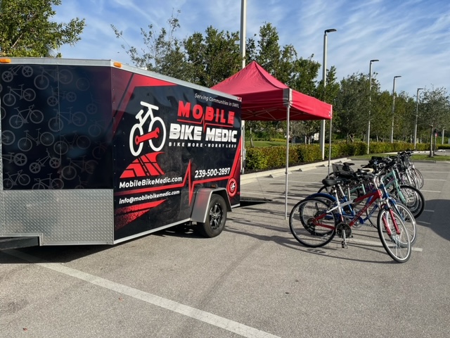 a bicycle parked on the side of a road