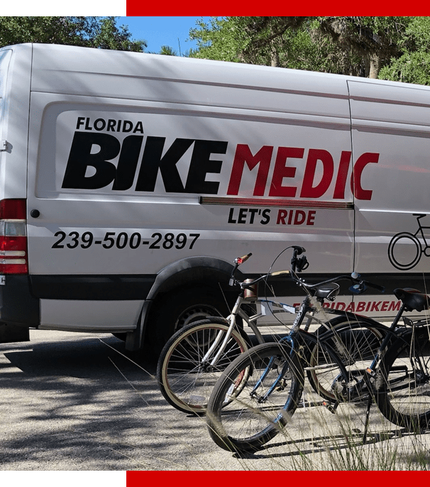 medic-bike a bicycle parked in front of a truck