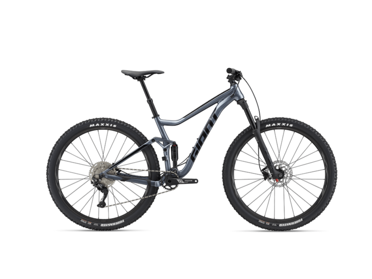 Full-suspension mountain bike with disc brakes and knobby tires on a white background.