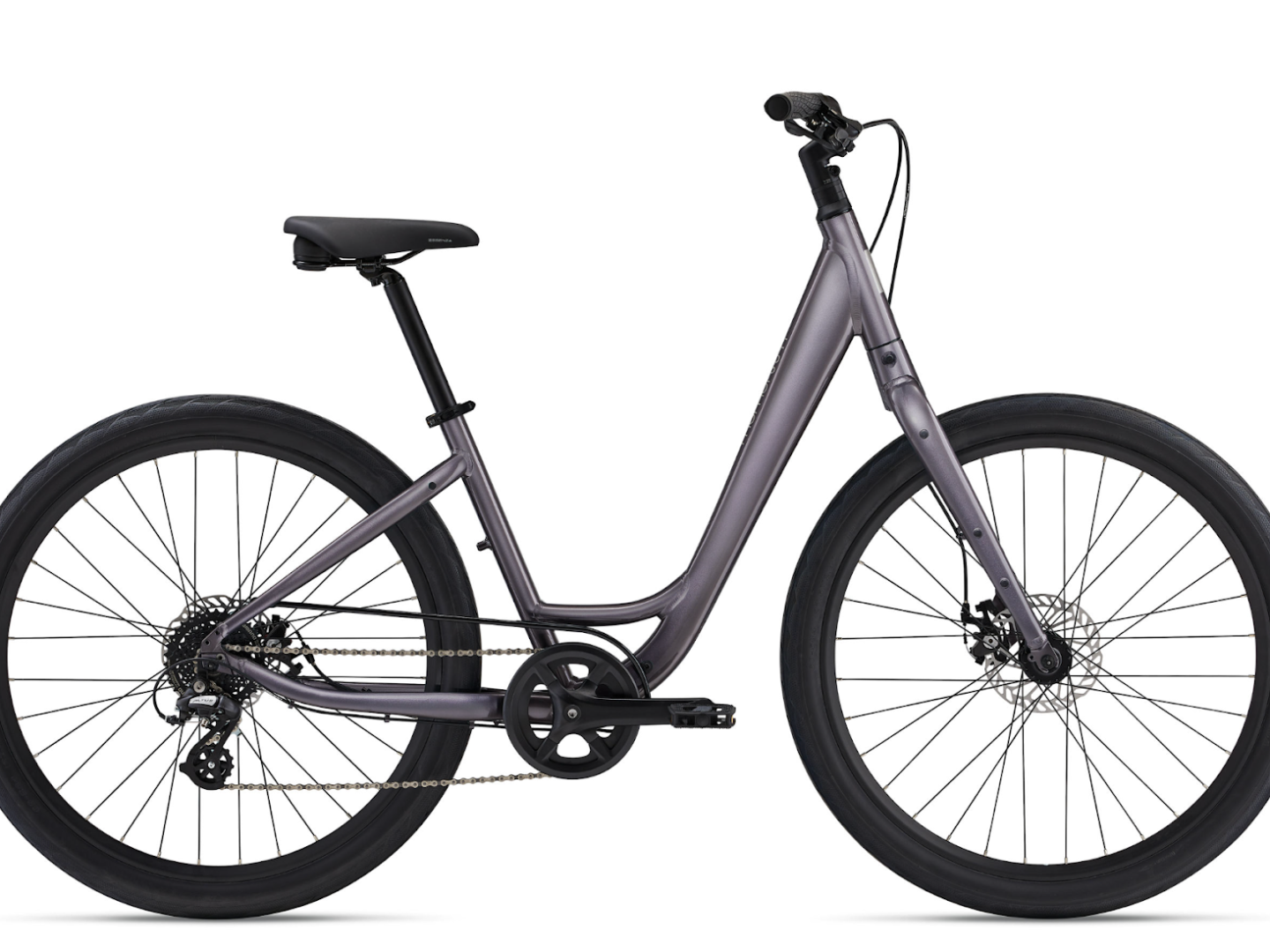 Purple step-through bicycle with black tires and disc brakes on white background.